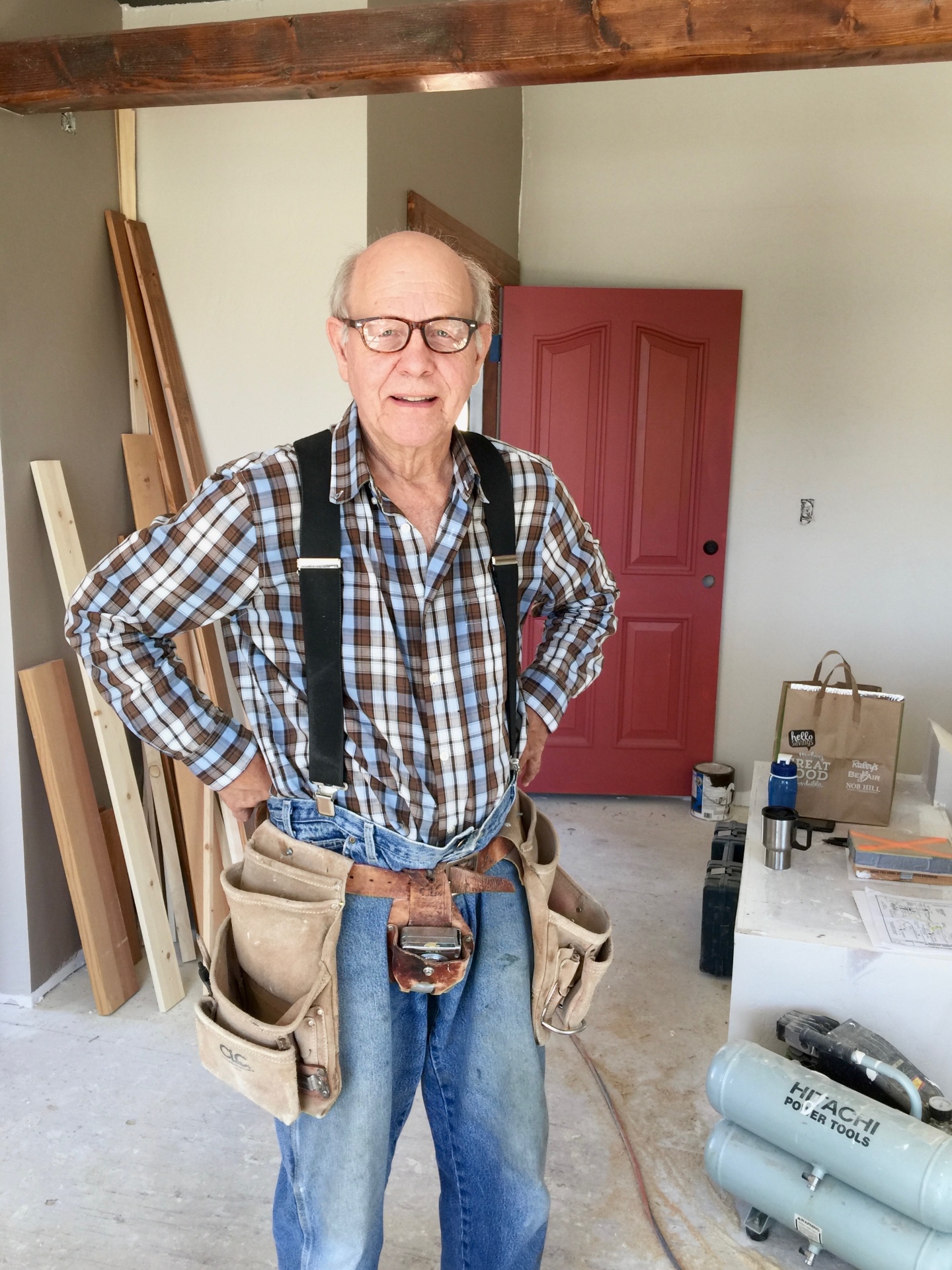 John Kinstle on site in his toolbelt during construction